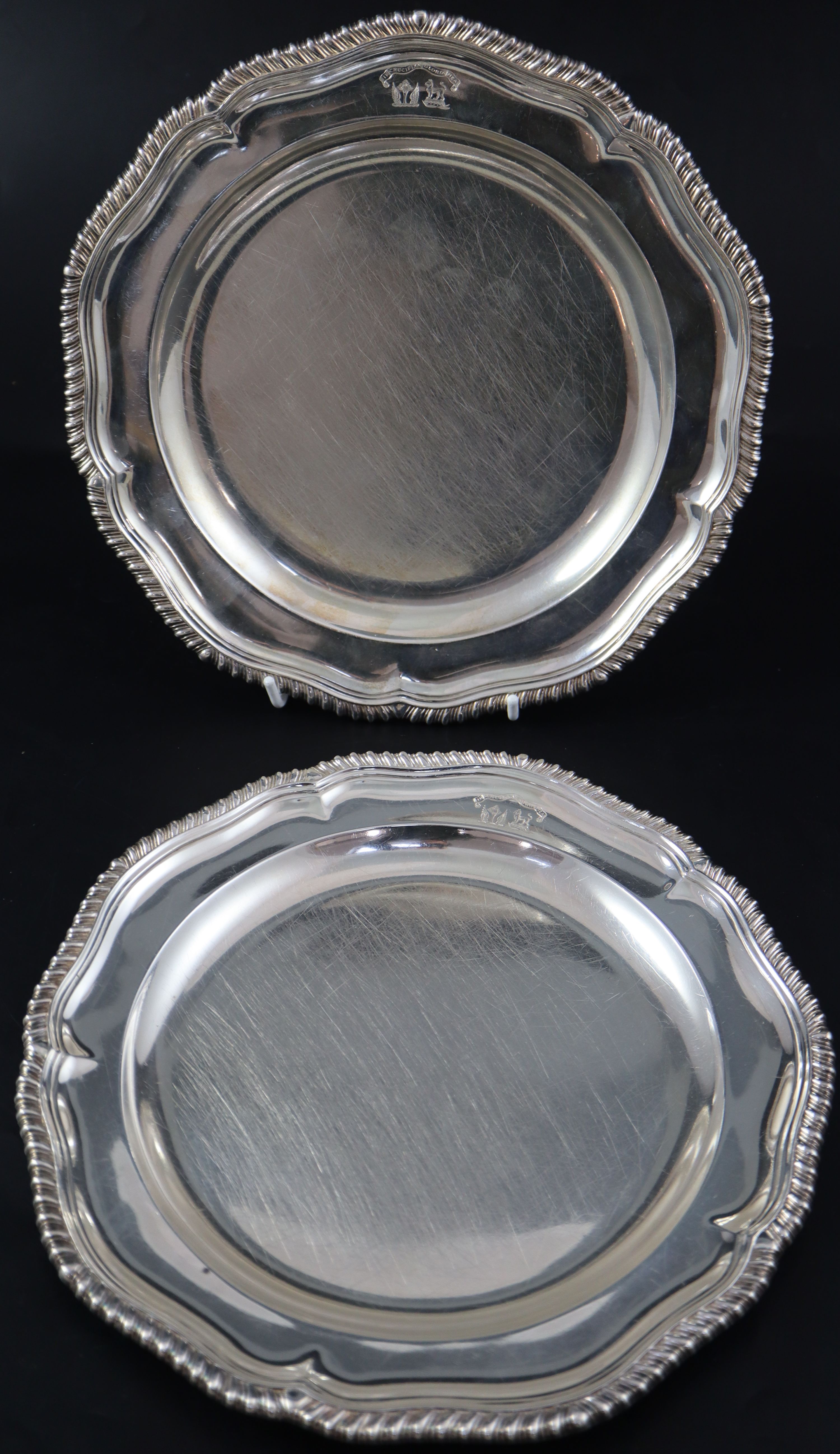 A pair of William IV silver dinner plates, by Robert Garrard, London, 1833, 25cm, 39oz